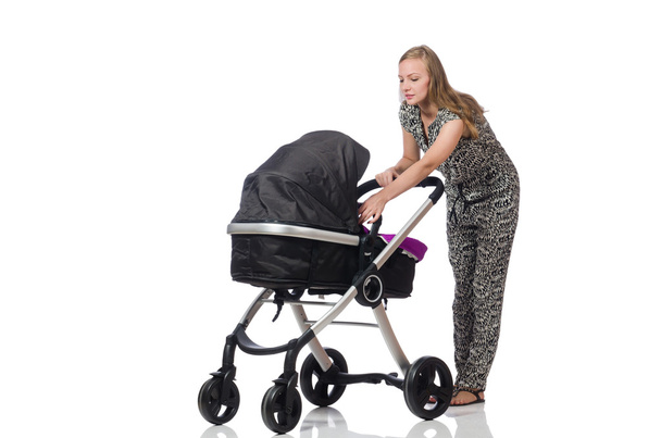 Happy mom with her baby in pram - Photo, Image