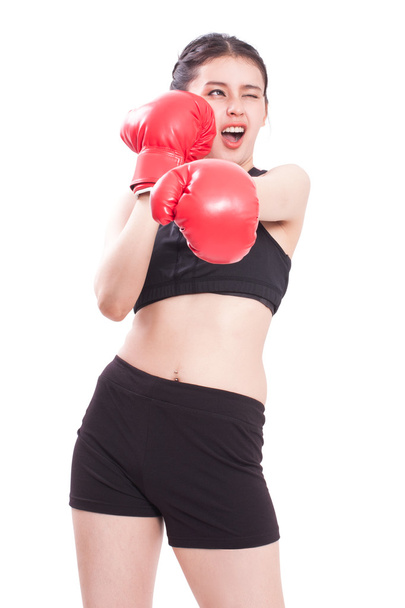 Fitness woman wearing boxing gloves - Fotó, kép