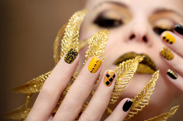 Yellow black manicure. - Fotoğraf, Görsel