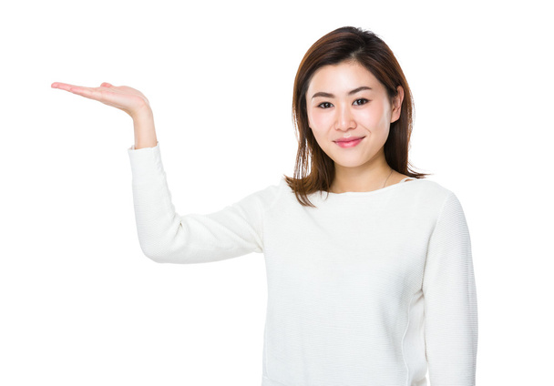 Asian young woman in white sweater - Foto, Bild