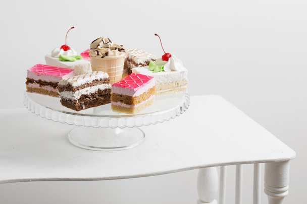 cakes on white table - Fotó, kép