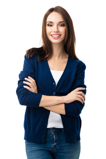 smiling young woman with crossed arms, isolated - Foto, afbeelding