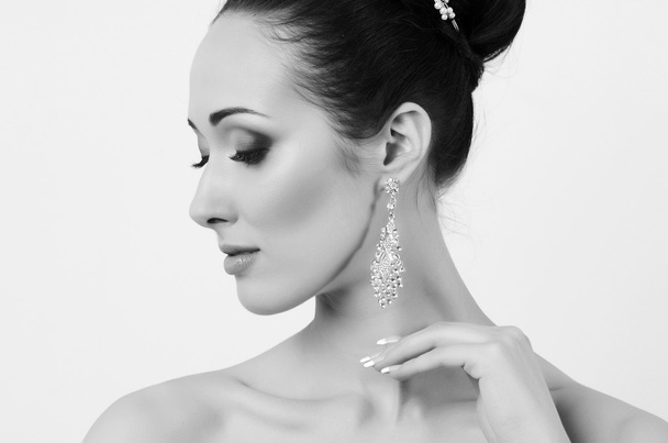 woman in expensive earring - Foto, Imagem