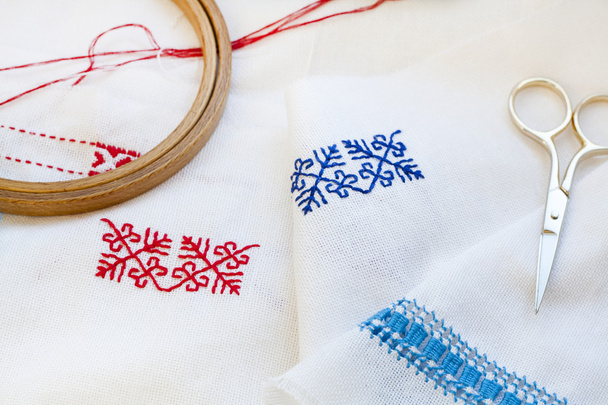Samples Ukrainian embroidery, unfinished work in progress and tools for embroidery - Φωτογραφία, εικόνα