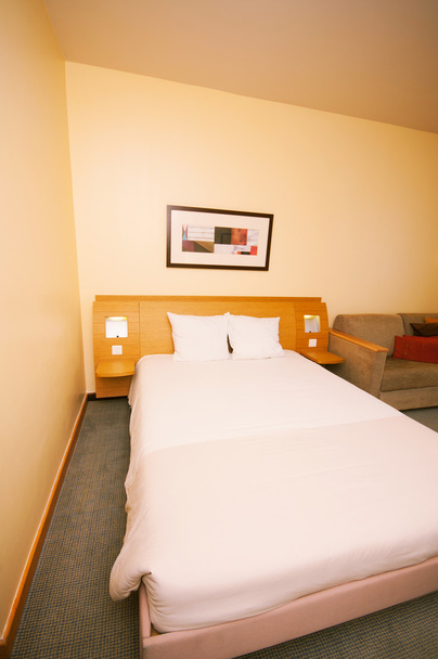 comfortabele kamer in het hotel - Foto, afbeelding