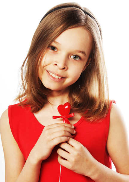 little girl in red dress - Foto, afbeelding
