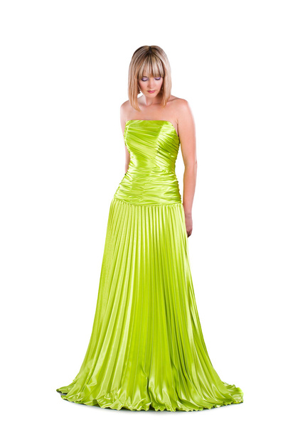Pretty young woman wearing green gown posing isolated on white - Photo, Image