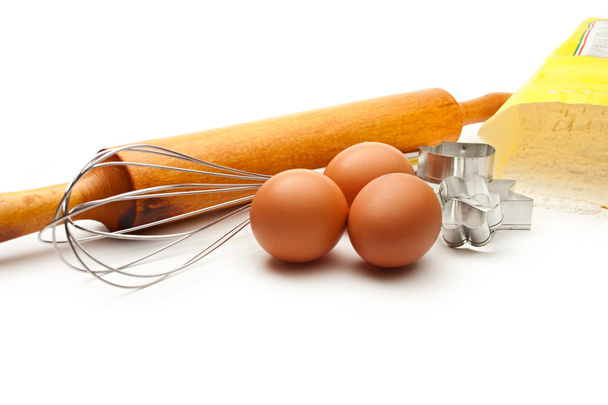 Eggbeater, eggs, flour and cookies forms - Photo, Image