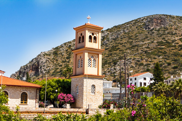 A igreja de São Nicolau com minarete ao pôr-do-sol na cidade velha de Chania, Creta, Grécia
 - Foto, Imagem