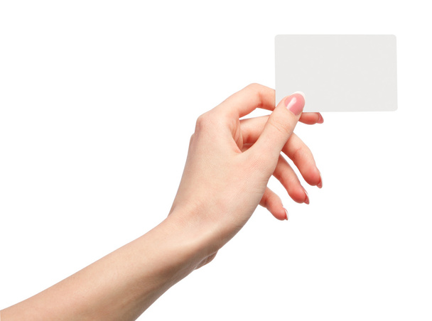 Mano femenina sosteniendo una tarjeta de visita en blanco
 - Foto, imagen