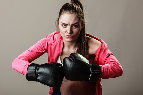 Fit girl with gloves on boxing - Φωτογραφία, εικόνα