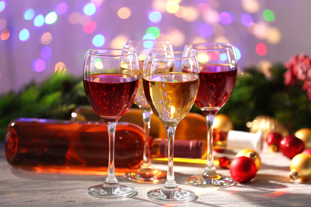 Wine and Christmas decoration on bright background - Fotó, kép
