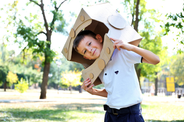 Funny boy in carton helmet  - Photo, Image