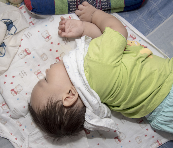 Asian baby sleeping and drinking milk from the bottle - Photo, image