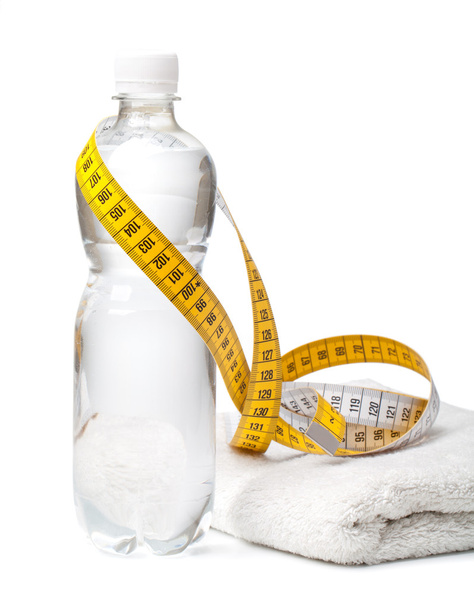 Bottle of water,towel and tape measure - Photo, Image