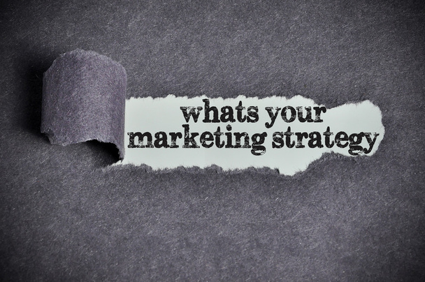 whats your marketing strategy word under torn black sugar paper - Photo, Image