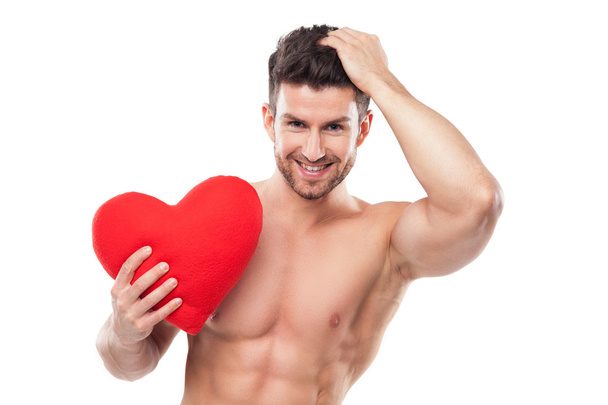 Homme musculaire tenant la forme du cœur
 - Photo, image