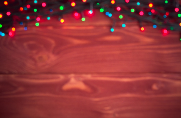 Christmas rustic background - vintage planked wood with lights a - Photo, Image