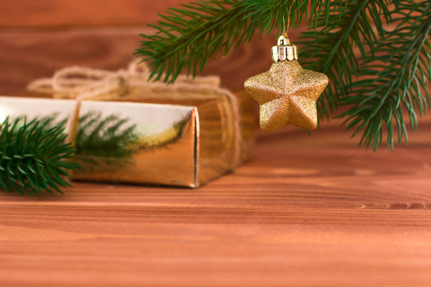 Christmas toys and gifts Christmas tree ornaments on the wooden - Foto, imagen