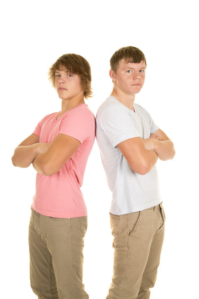 two teenage boys back to back - Foto, Bild