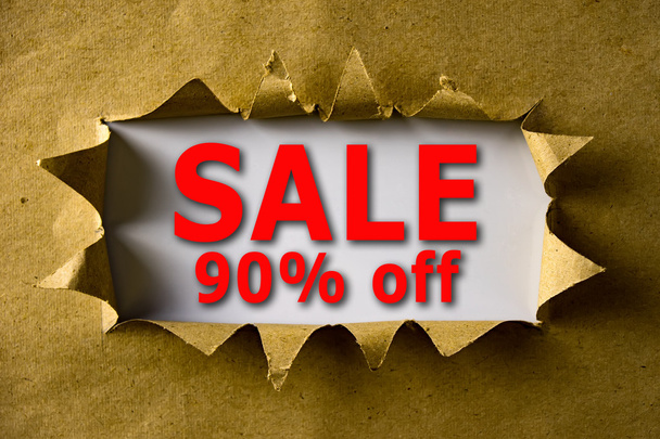 Torn brown paper with SALE 90% OFF words - Photo, Image