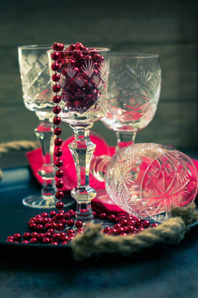 Old crystal glasses and christmas time decoration - Foto, Imagen