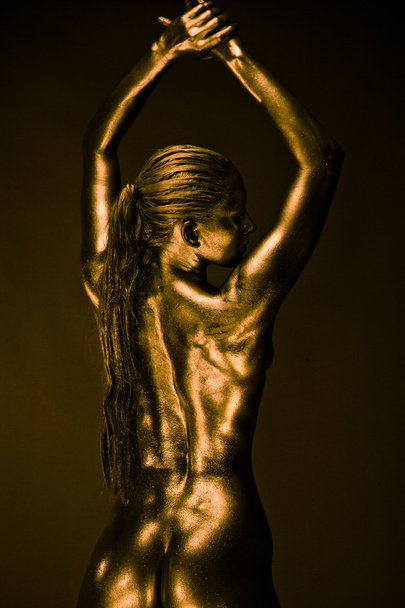 Nude woman like statue in liquid metal - Foto, imagen