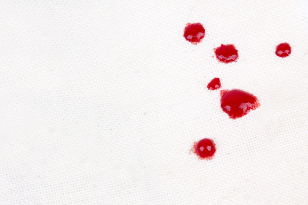 Sangue no tecido
 - Foto, Imagem