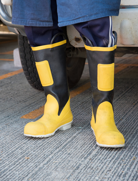 yellow and black color fireman boots - Foto, immagini