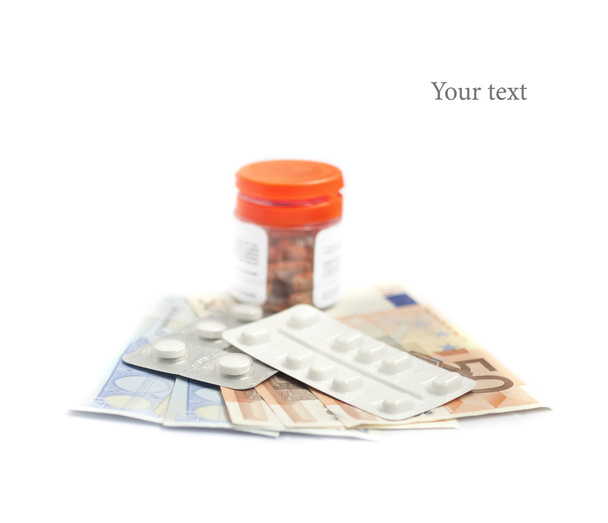 Χάπια και τραπεζογραμμάτια: ιατρικές δαπάνες έννοια - Φωτογραφία, εικόνα