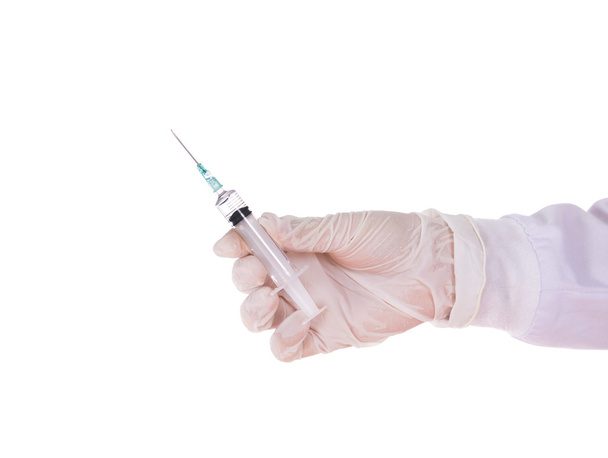 hand of doctor holding syringe - 写真・画像