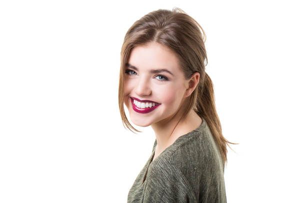 Portrait of a smiling brunette woman. - Foto, Imagen