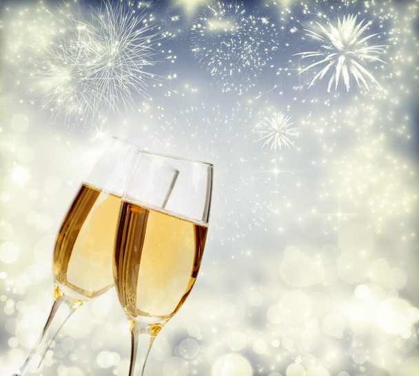 Праздничный фон с игристыми огнями и шампанским
 - Фото, изображение