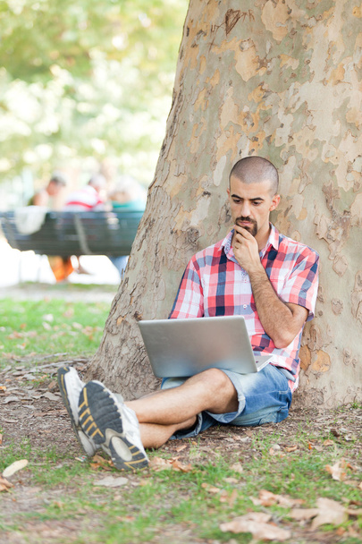 Young Man With Computer at Park - Photo, Image