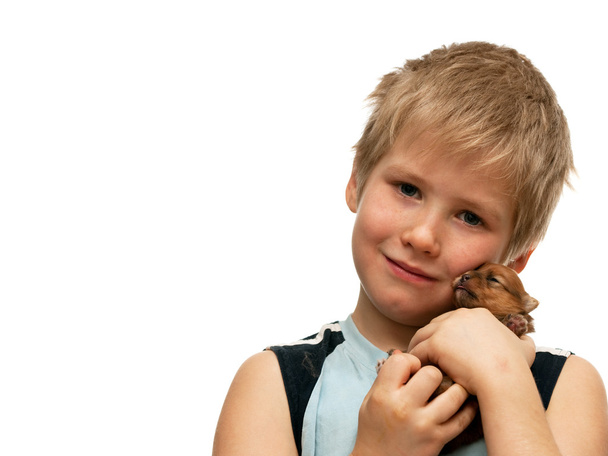 Retrato de un niño con un cachorro
 - Foto, imagen