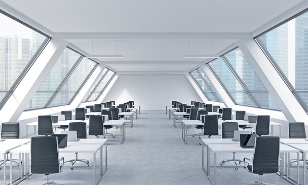 Lieux de travail dans un lumineux bureau loft moderne à aire ouverte. Tables blanches équipées d'ordinateurs portables modernes et de chaises noires. Singapour vue panoramique aux fenêtres. rendu 3D
. - Photo, image