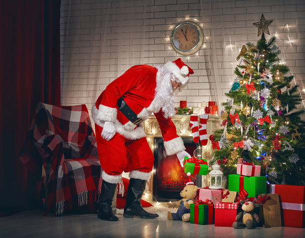 Santa Claus with christmas gifts - Fotoğraf, Görsel