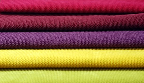 Багатокольорові текстильні тканини. Зразки тканин
 - Фото, зображення