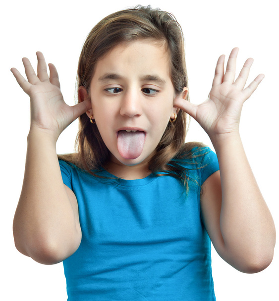 Small girl making a funny face isolated on white - Foto, imagen