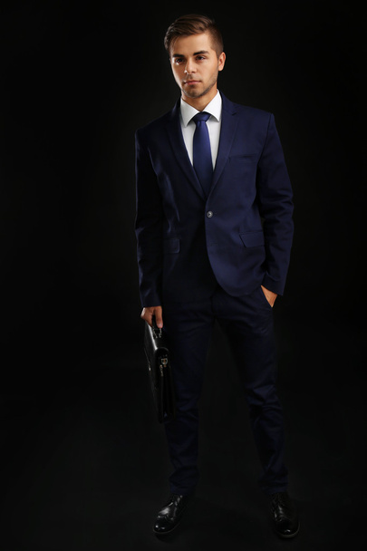 Elegant man in suit with briefcase  - Fotoğraf, Görsel