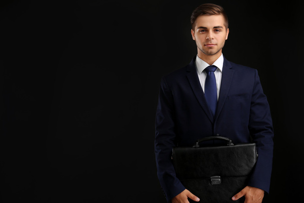 Elegant man in suit with briefcase  - Valokuva, kuva