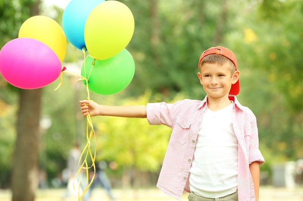 Little boy with balloons  - Foto, afbeelding