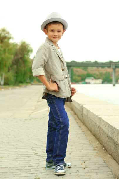 Little boy on the riverside - Photo, Image