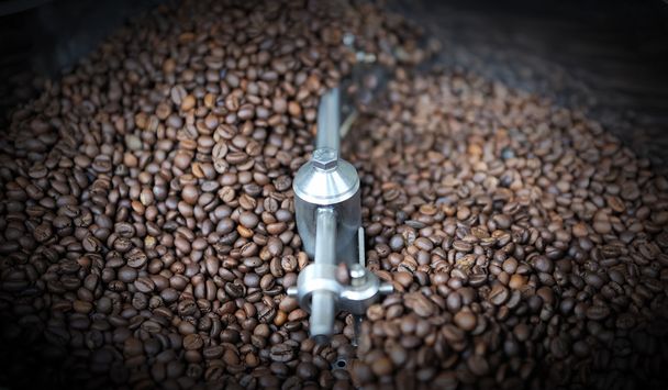 Mixing roasted coffee - Photo, Image