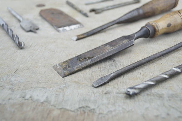Assorted old work tools on wooden - Fotó, kép
