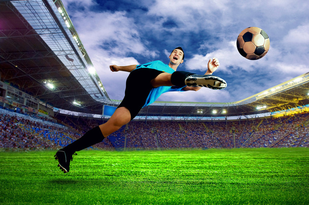 Football player on field of stadium - Photo, Image
