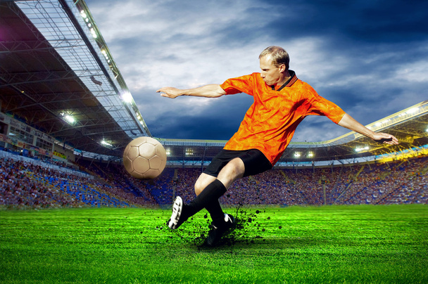 Football player on field of stadium - Φωτογραφία, εικόνα