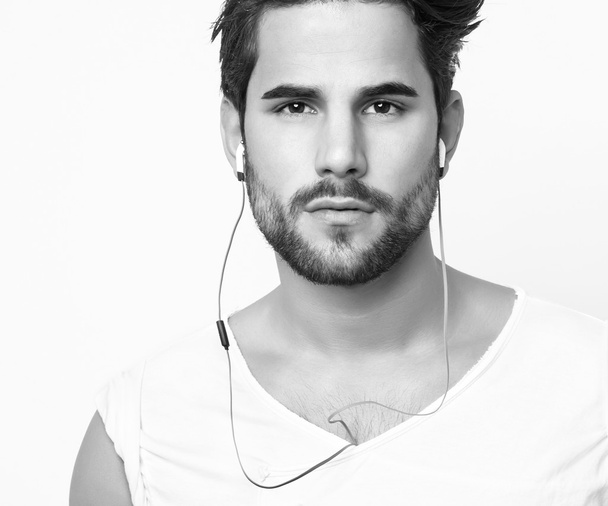 young and fit man with earphones - Φωτογραφία, εικόνα