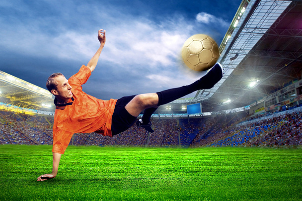 Football player on field of stadium - Photo, Image