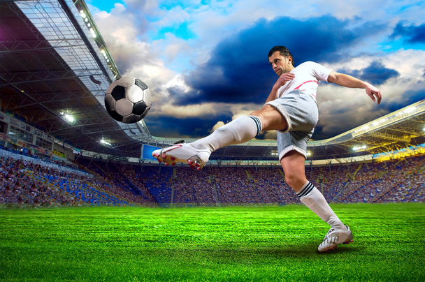 Football player on field of stadium - Φωτογραφία, εικόνα